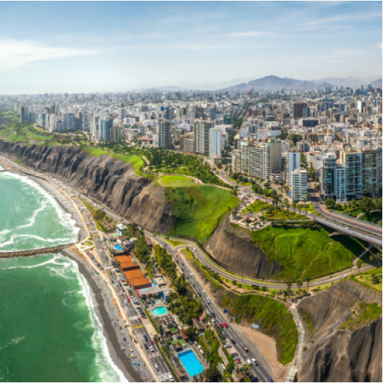 Hikers walking the Inca Trail surrounded by mountains